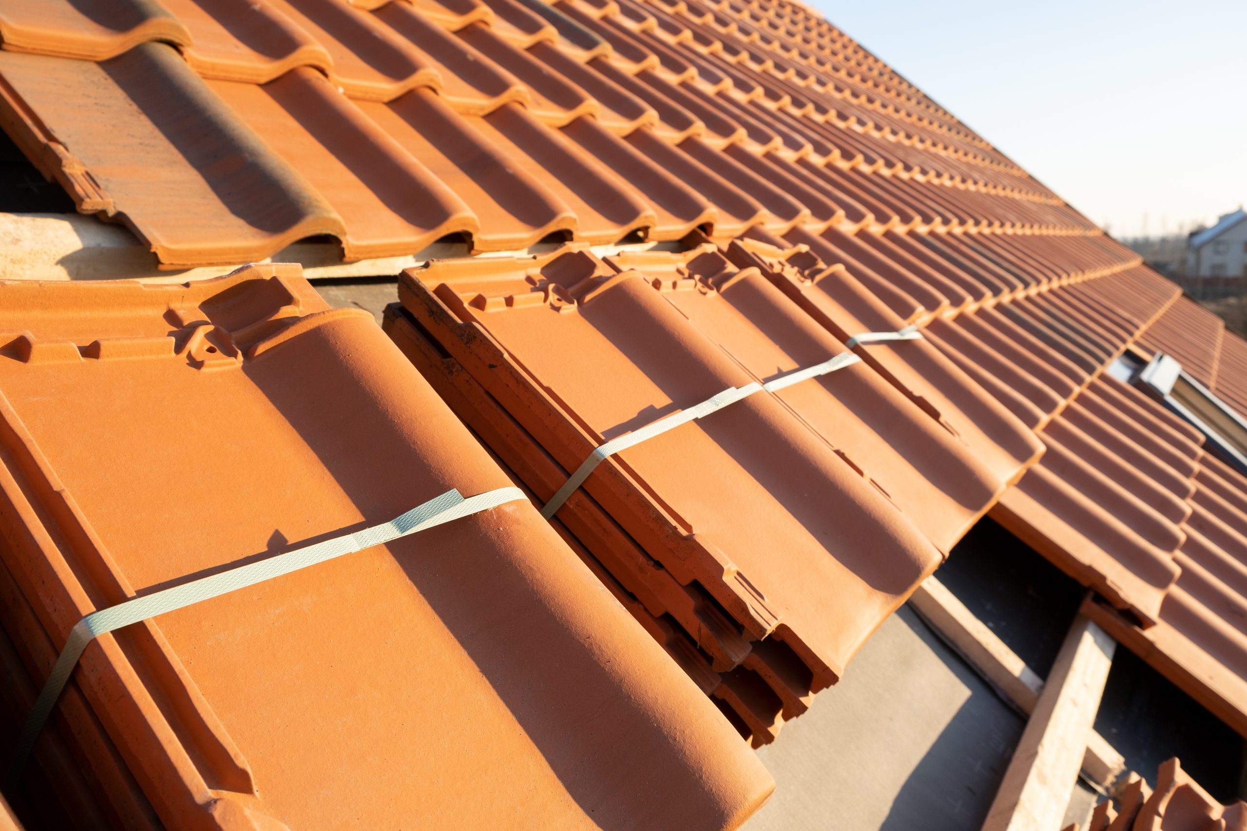 Stack of yellow tiles on roof Stack of yellow tiles on roof